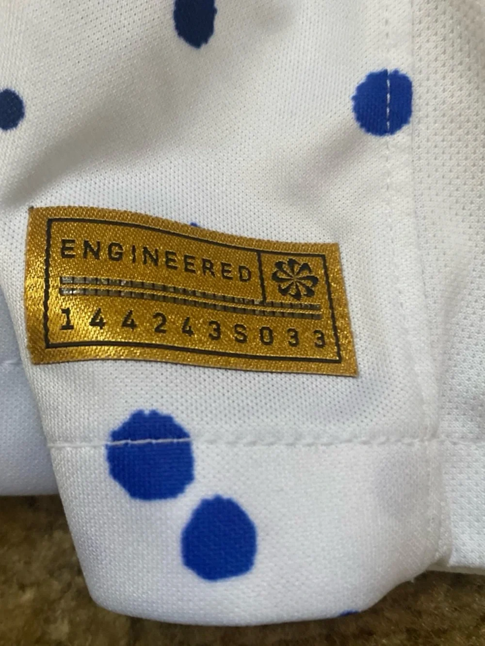 Nike  USA White Jersey with Blue Splatter and Gold Swoosh